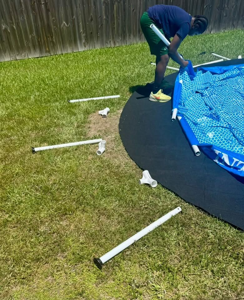 Above-ground pool frame assembly in progress